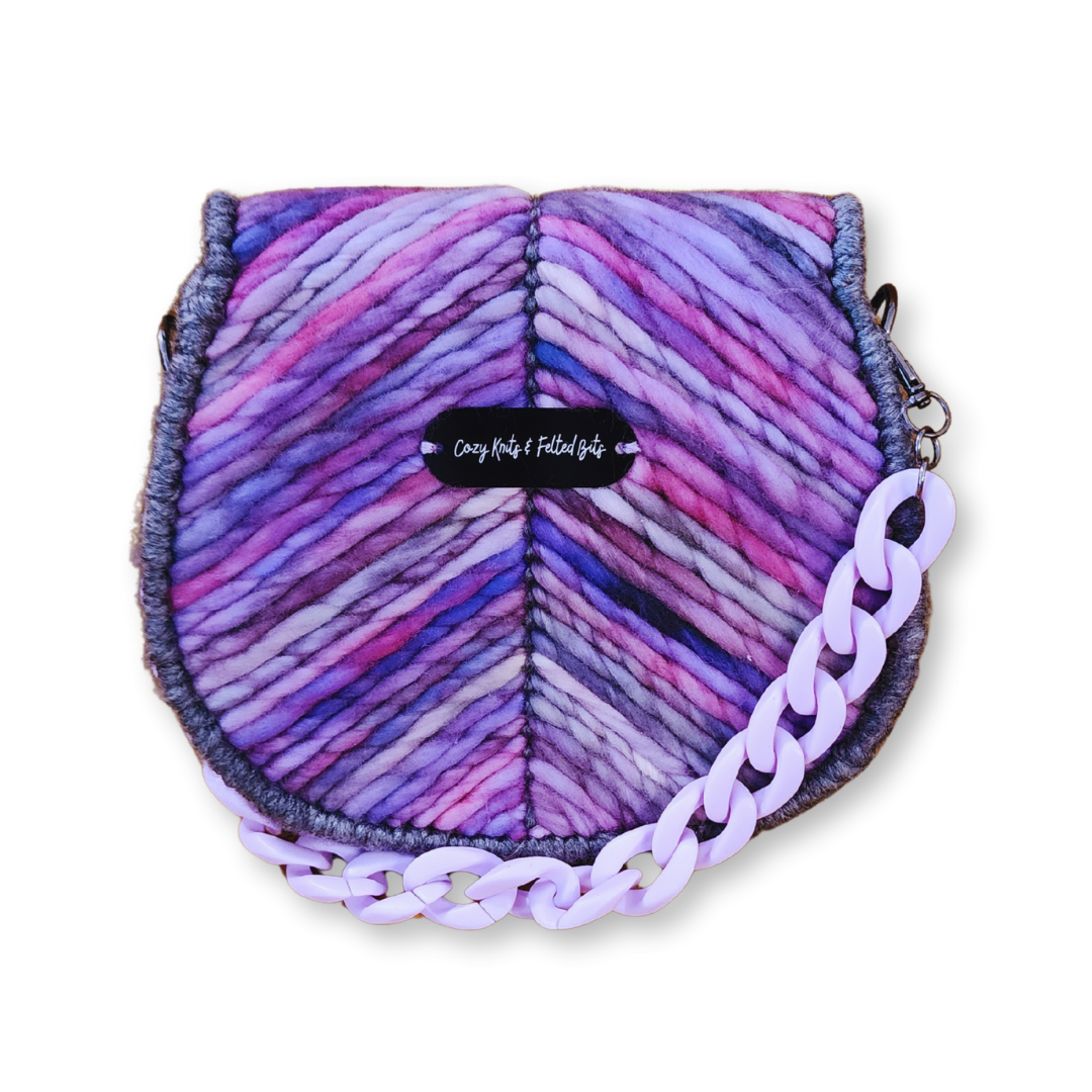 Back view of the structured fiber bag showcasing the CKFB Original logo plate and the seamless continuation of the hand-embroidered chevron pattern.