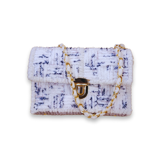 Front view of the Seaside Checkerboard Mini Clutch highlighting the navy blue and white chenille yarn checkerboard pattern. The image showcases the gold push-lock clasp and the 9mm gold chain strap with chenille yarn woven through it.