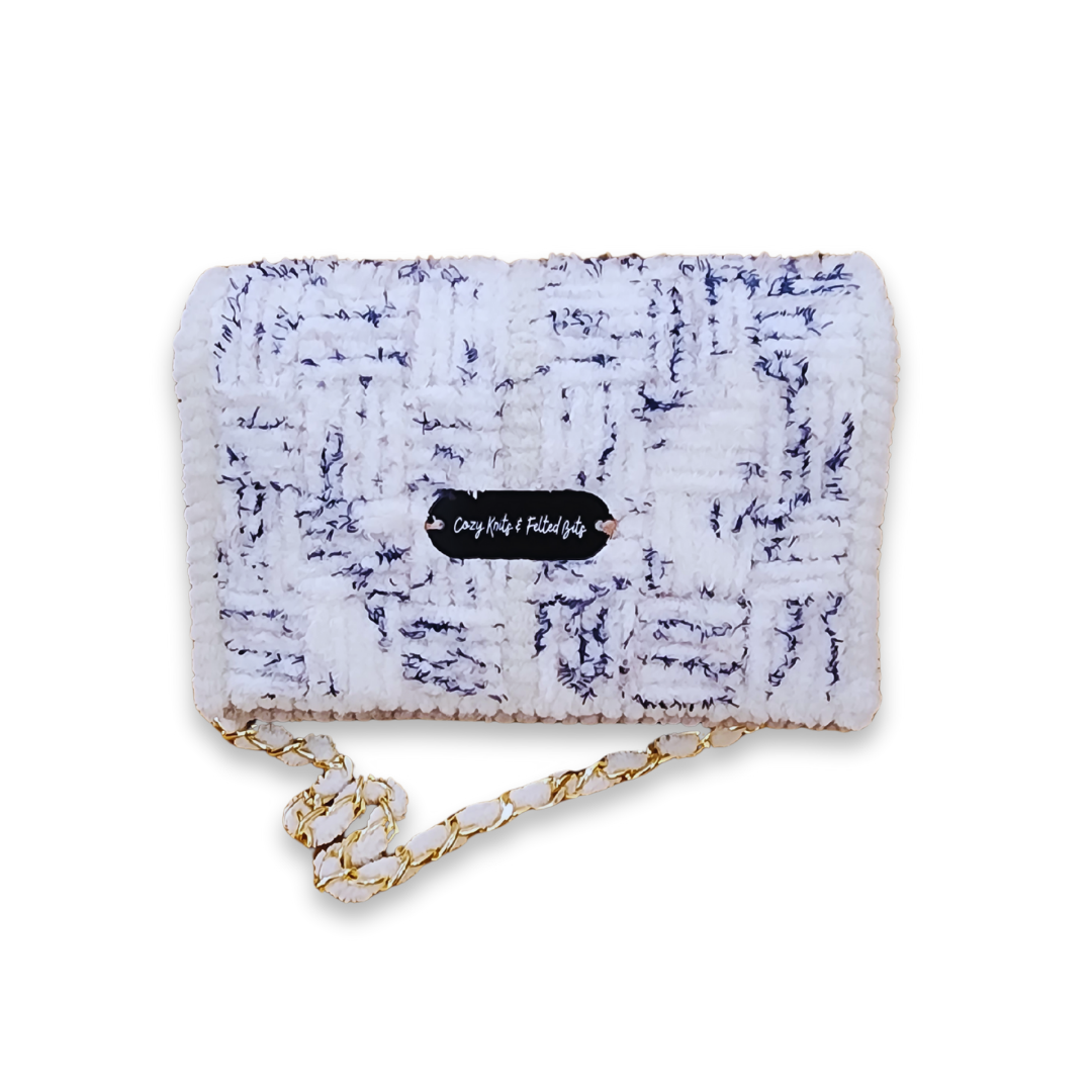 Back view of the structured fiber bag featuring the CKFB Original logo plate. The navy and white checkerboard pattern transitions seamlessly into the light grey chenille frame.