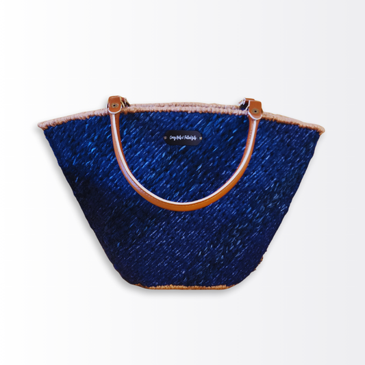 Full-length front view of the $249 Scalloped Artisan Tote with caramel leather handles, highlighting its unique wave-like pattern and premium nautical aesthetic.