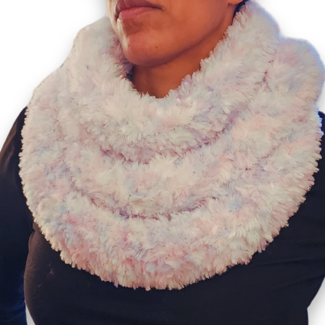 A close-up view of the skinny "unicorn" faux fur infinity scarf, highlighting the soft, multi-colored pastel blend.