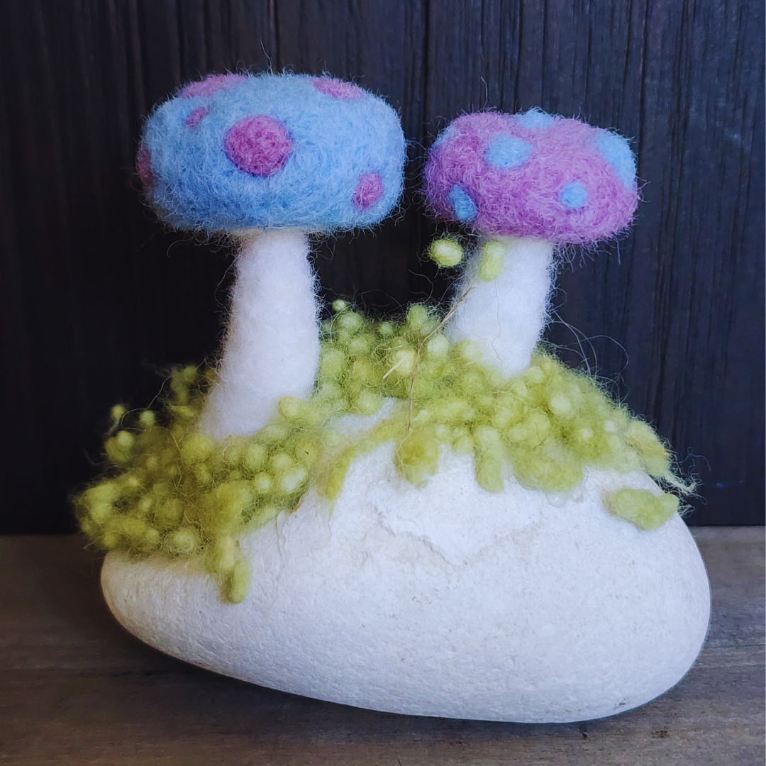 Handmade Felt Magic Mushrooms on White Granite Stone