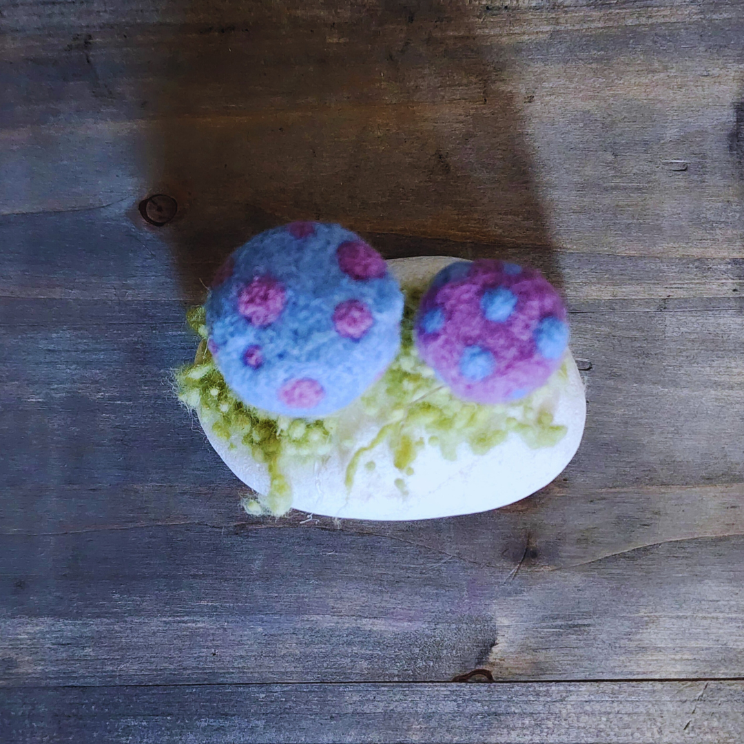 Handmade Felt Magic Mushrooms on White Granite Stone