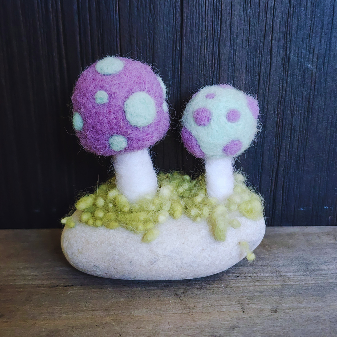 Handmade Felt Magic Mushrooms on White Granite Stone