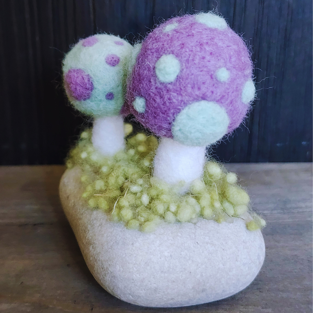Handmade Felt Magic Mushrooms on White Granite Stone
