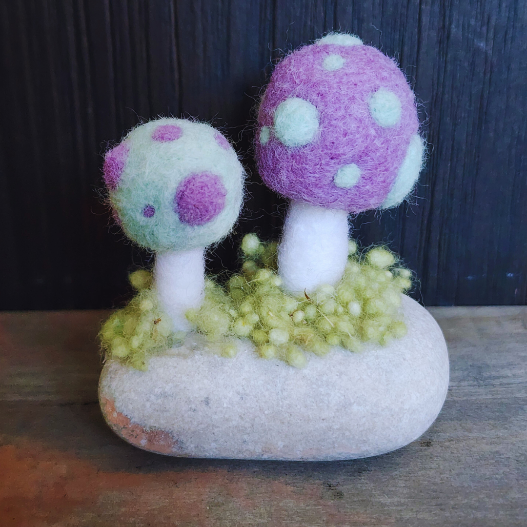 Handmade Felt Magic Mushrooms on White Granite Stone