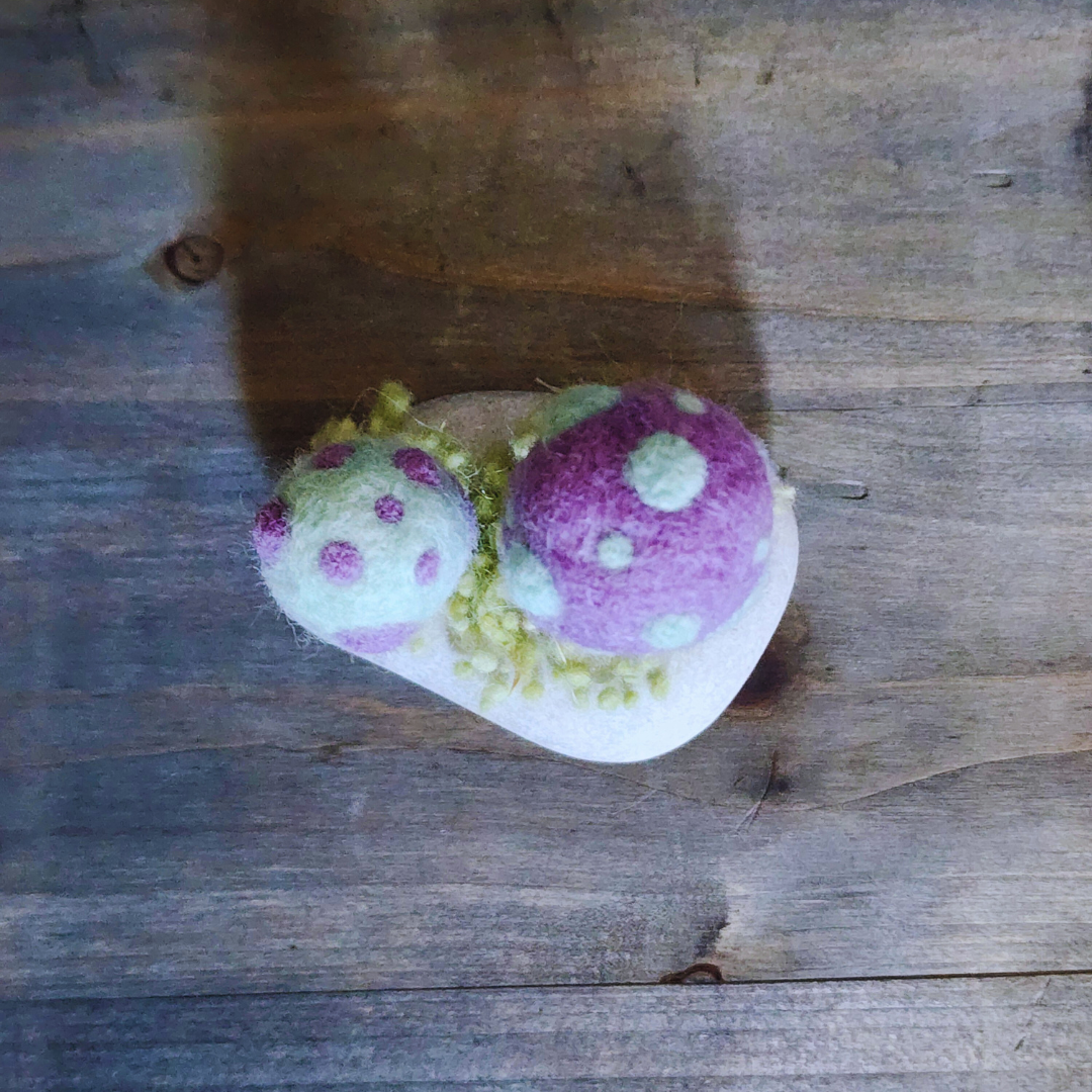 Handmade Felt Magic Mushrooms on White Granite Stone