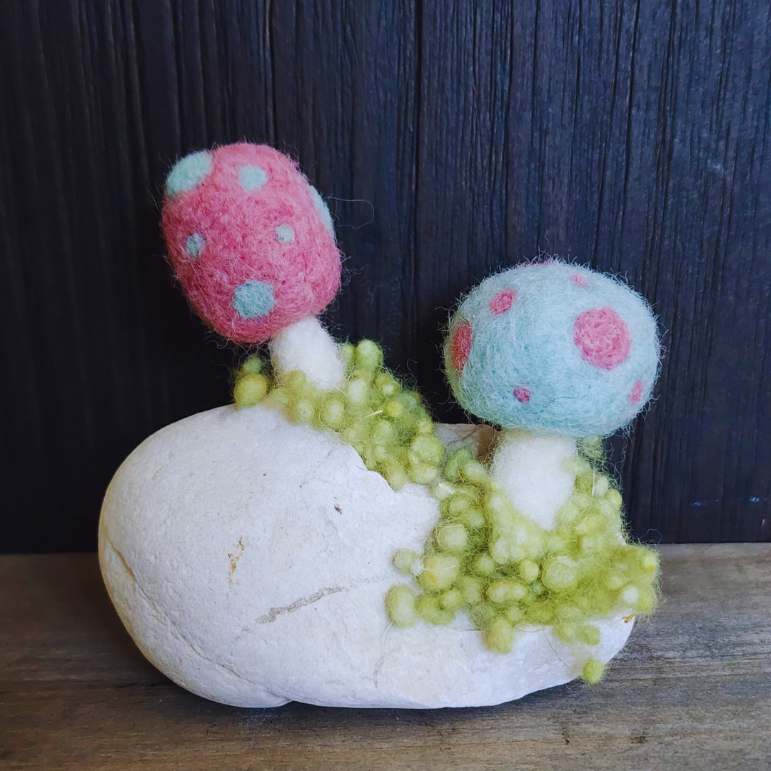 Handmade Felt Magic Mushrooms on White Granite Stone