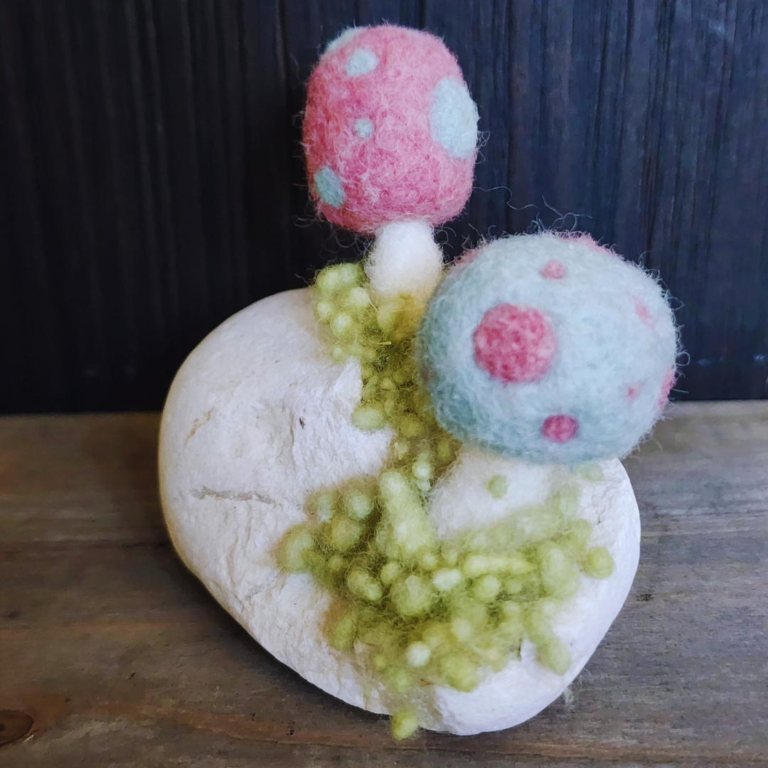 Handmade Felt Magic Mushrooms on White Granite Stone