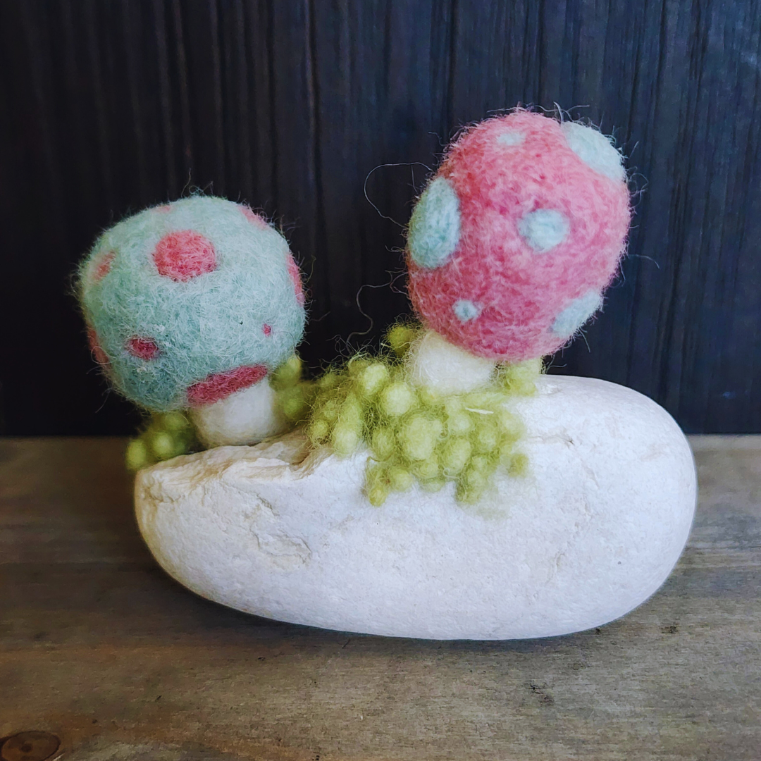 Handmade Felt Magic Mushrooms on White Granite Stone