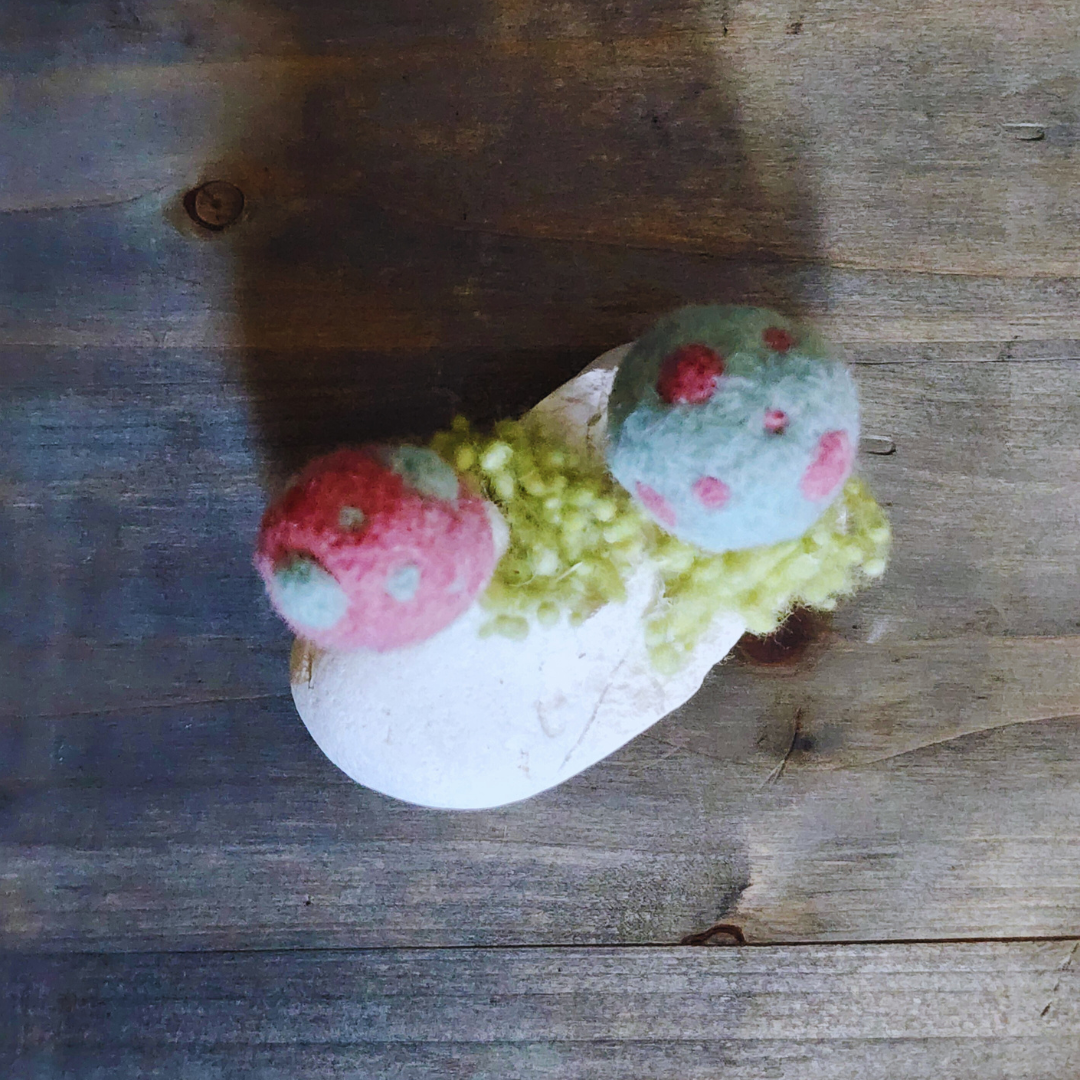 Handmade Felt Magic Mushrooms on White Granite Stone