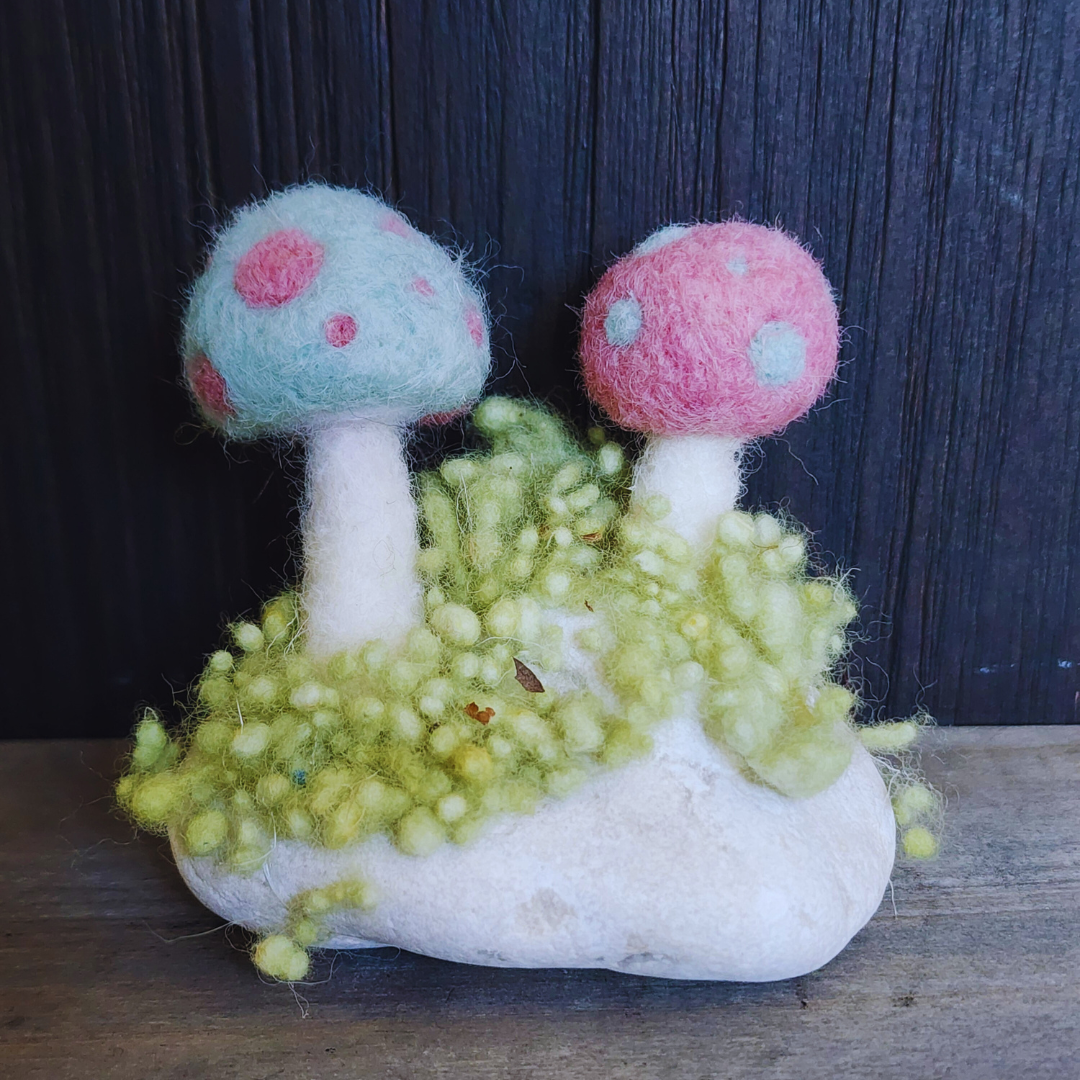 Handmade Felt Magic Mushrooms on White Granite Stone
