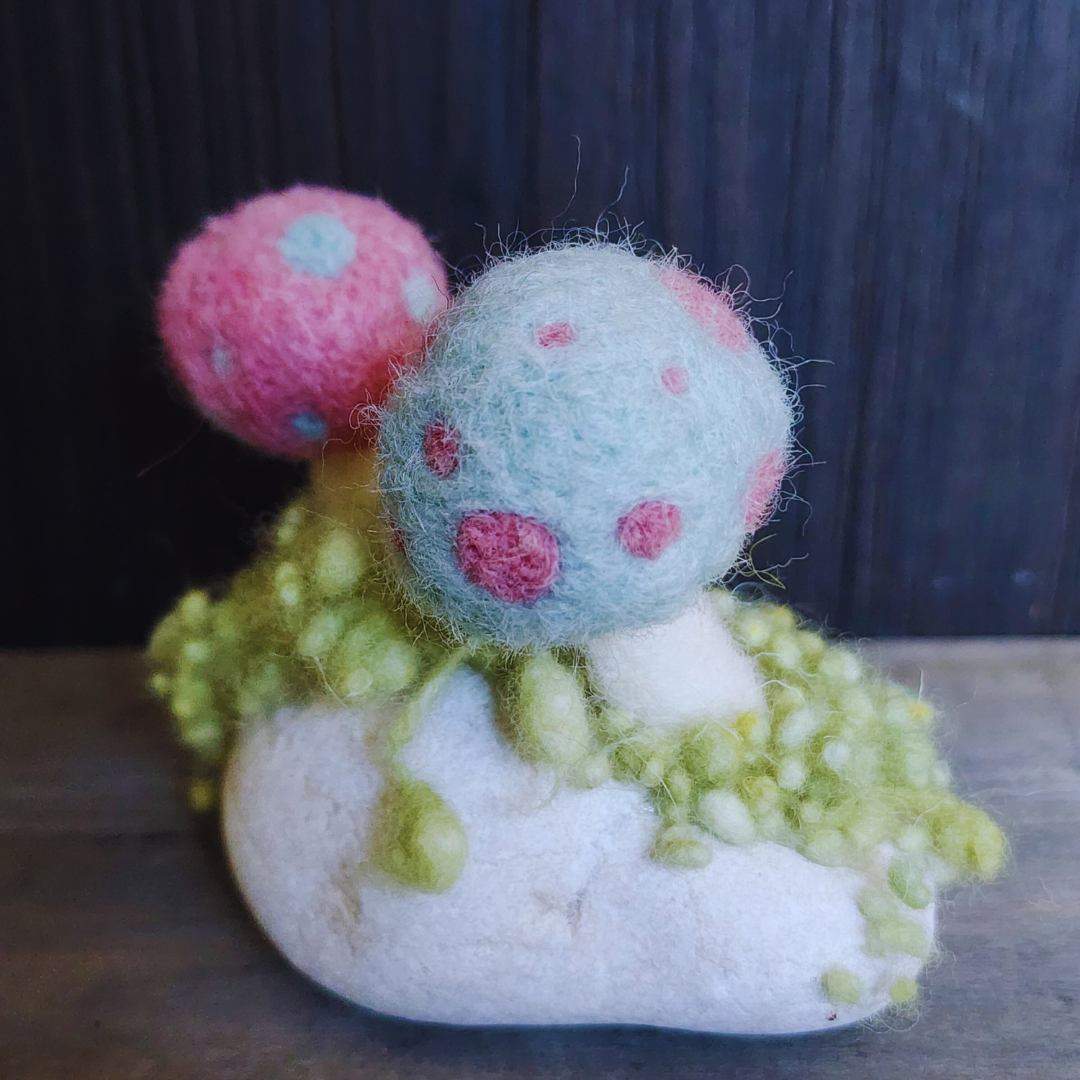 Handmade Felt Magic Mushrooms on White Granite Stone