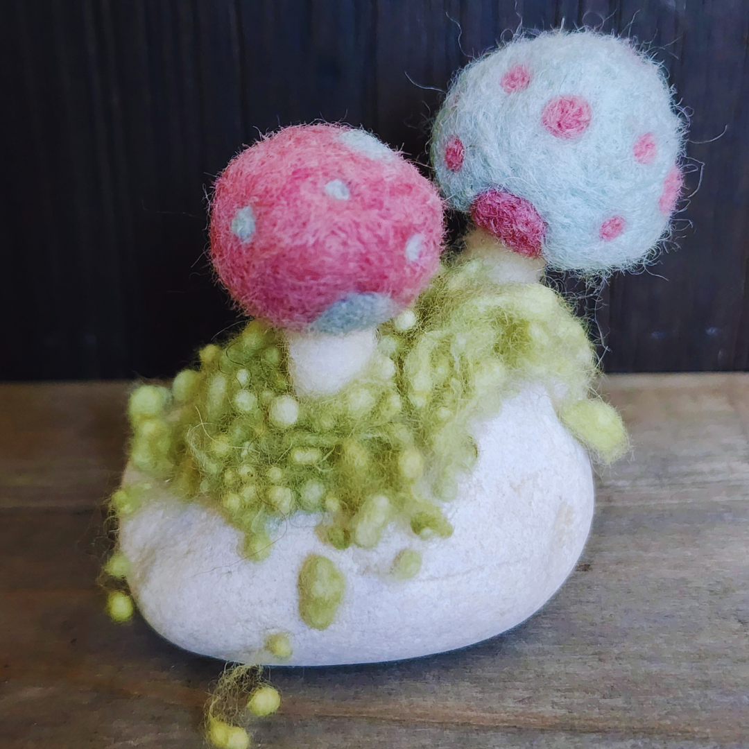 Handmade Felt Magic Mushrooms on White Granite Stone