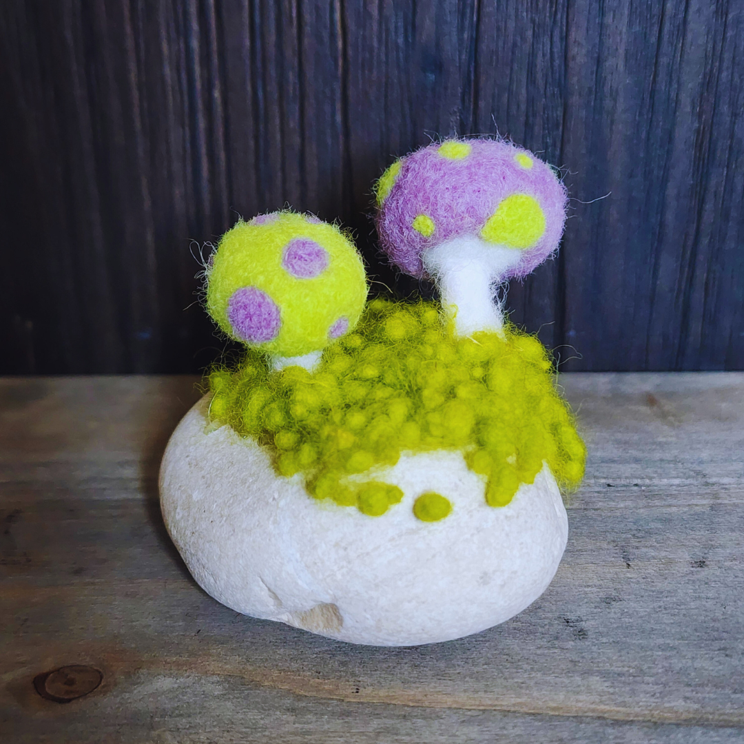 Handmade Felt Magic Mushrooms on White Granite Stone
