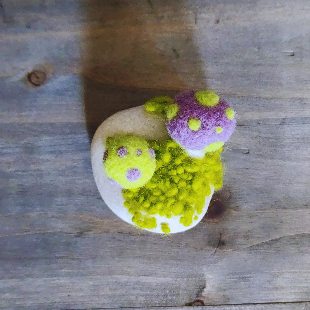 Handmade Felt Magic Mushrooms on White Granite Stone