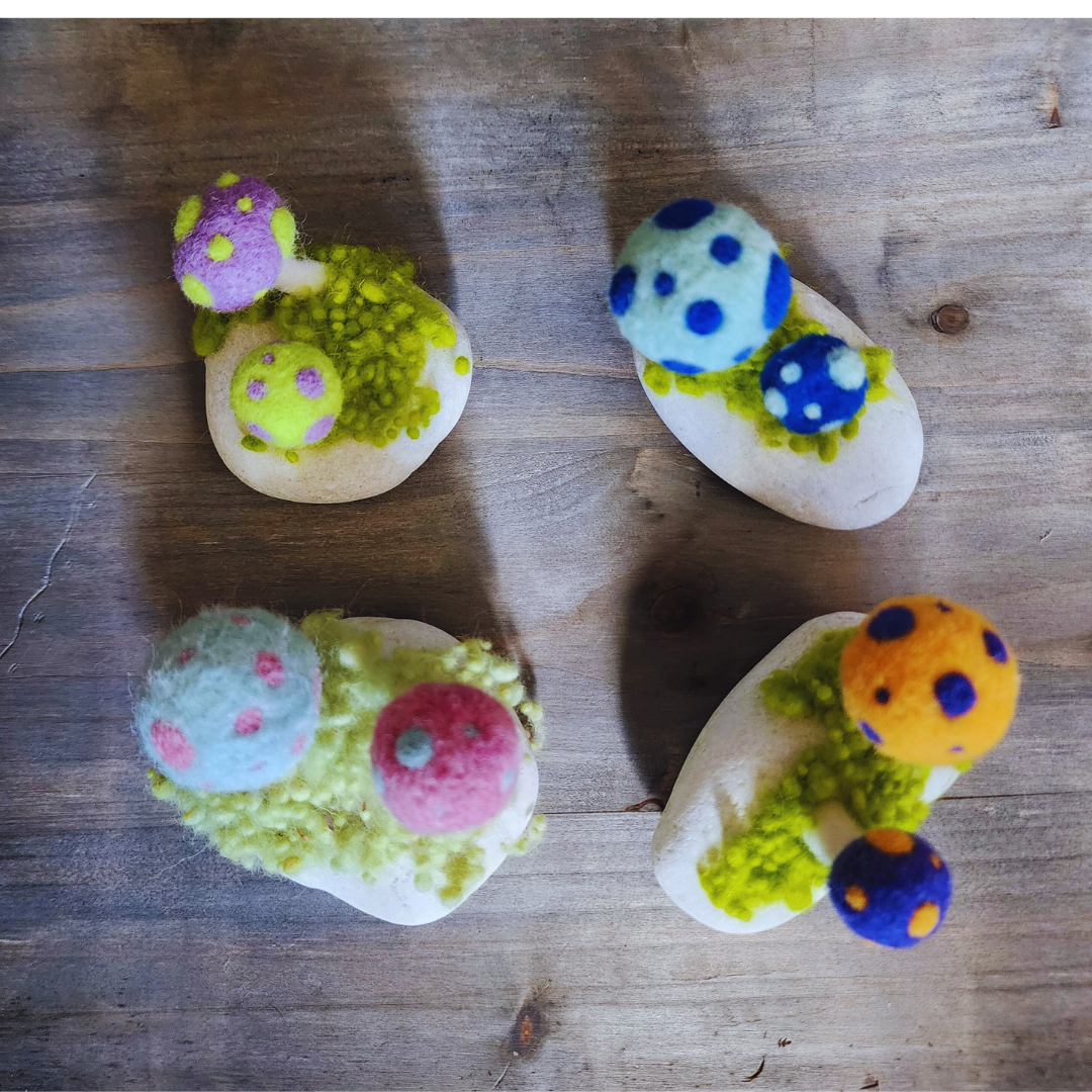 Handmade Felt Magic Mushrooms on White Granite Stone
